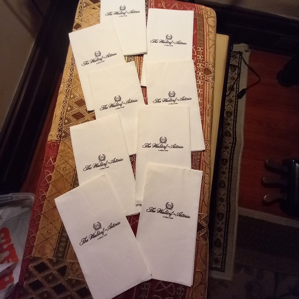 Eight WALDORF ASTORIA serviettes